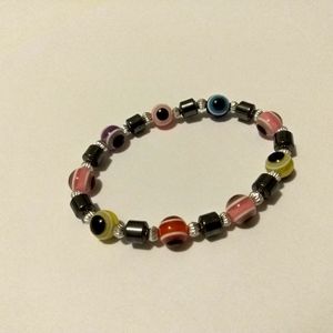 Turkish eye bracelet, 16cm expendable, black and multi color.